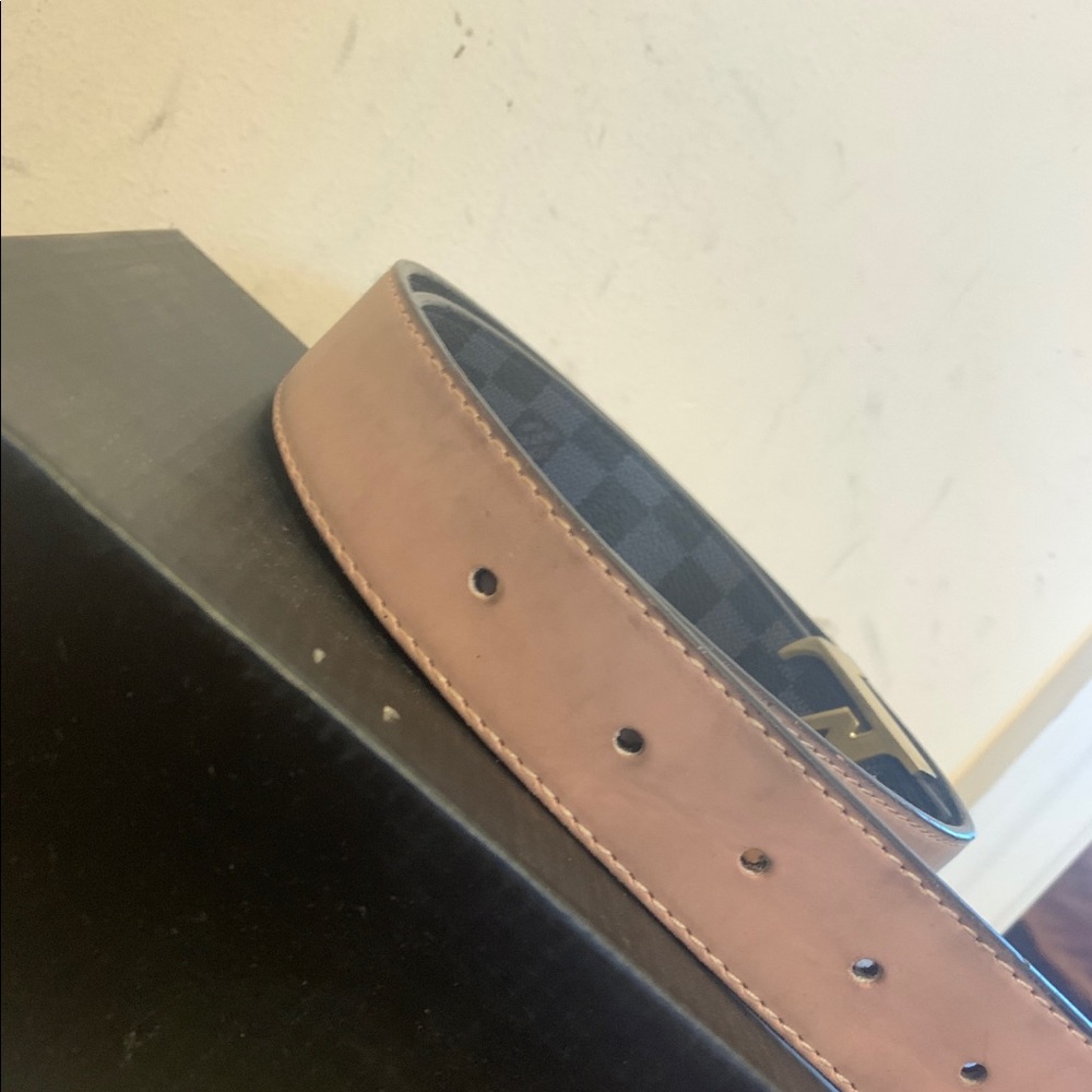 Black and gold lv belt
